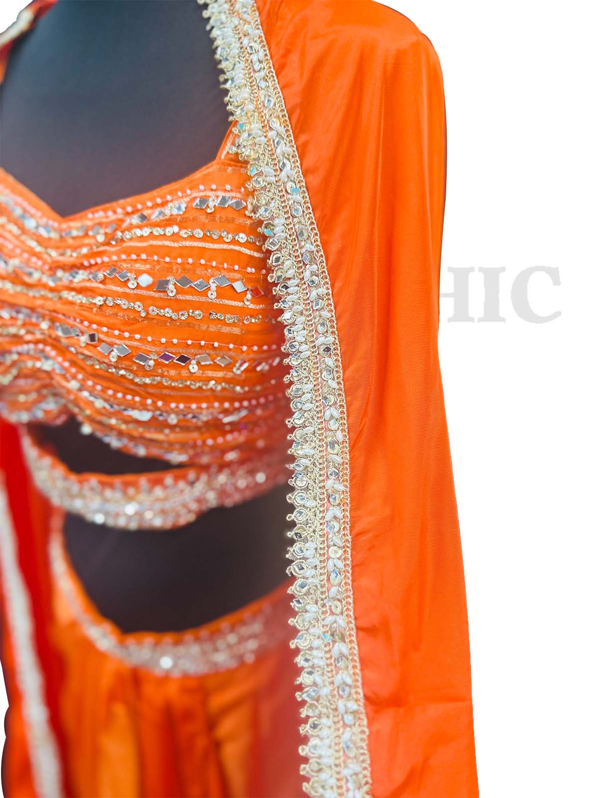 Orange organza shrug lehenga choli with heavy resham