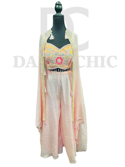 Off-white flared palazzo and crop top in Resham embroidery.