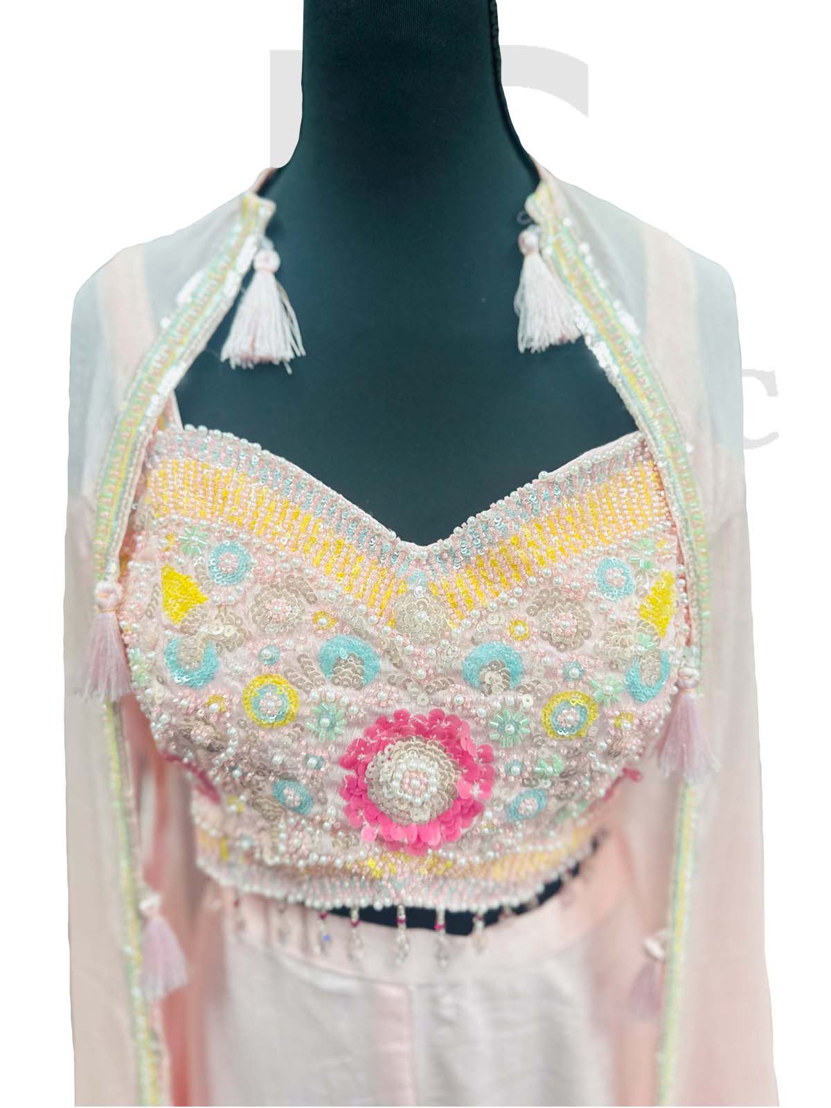 Off-white flared palazzo and crop top in Resham embroidery.